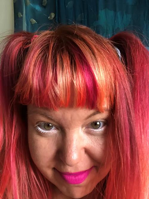 Hair Extensions photo, Denver Colorado. We wanted a fun straight bang with multidimensional pinks or(..)